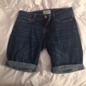 Mid length dark wash denim shorts