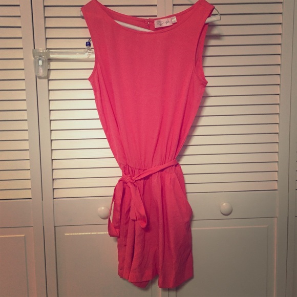 Pink romper with slit open-back, never worn