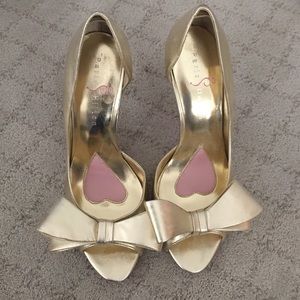 Paris Hilton gold peep-toe pumps