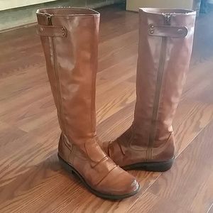 Tall brown leather boots