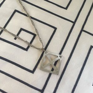 Cross in a diamond shape necklace