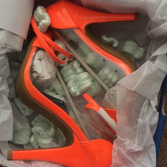 BRAND NEW!!! NEVER WORN!! Neon/Clear heels
