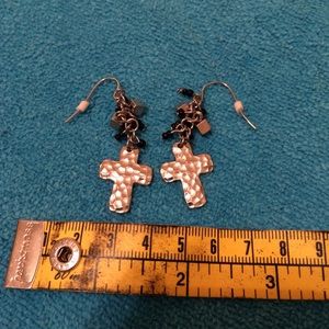 Never worn cross earrings.