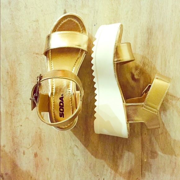 New, gold Sandalss