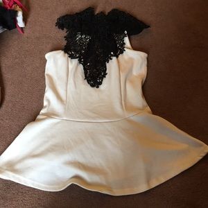 White and black peplum shirt