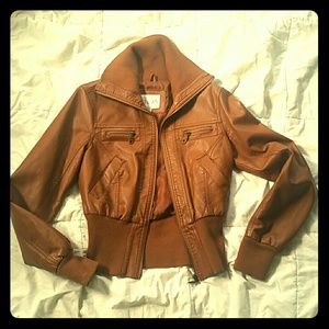 Delia's brown leather jacket