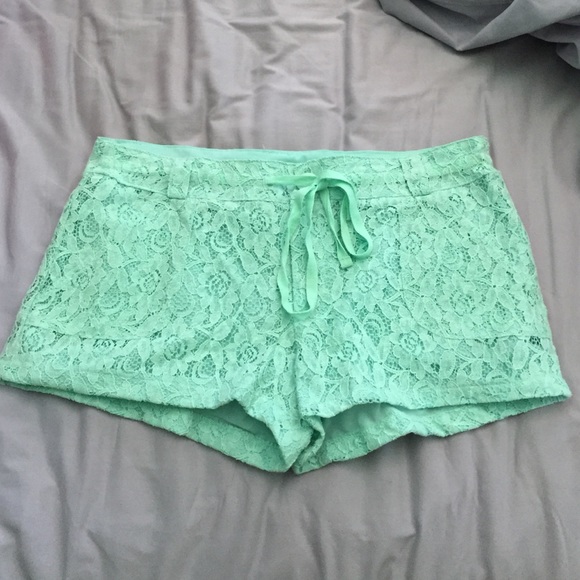 Mint floral lace covered shorts
