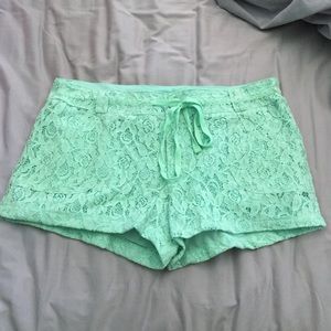 Mint floral lace covered shorts