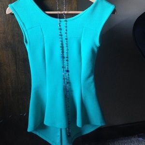 Cute Aqua colored shirt with necklace