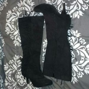 Fringed black boots by Fergie