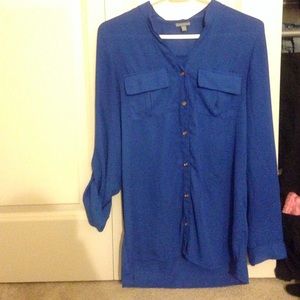 Royal blue polyester button up shirt. Size M