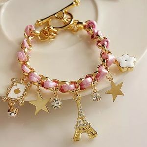 Betsy Johnson poker charm and Paris theme bracelet