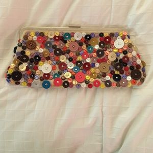 Aldo unique button-studded clutch