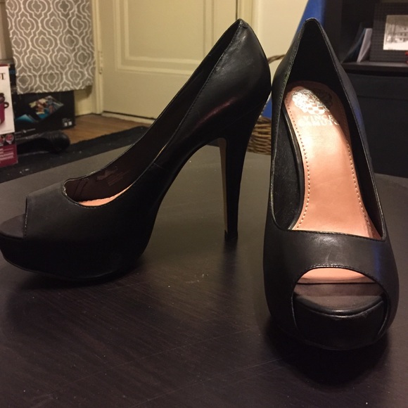 black peep toe heel. Very little ware.