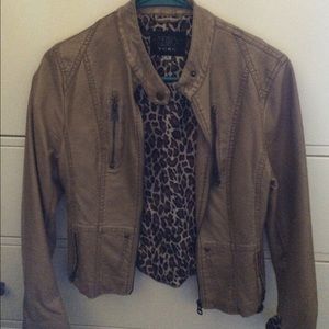 A tan-brownish leather Jacket