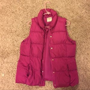 A pink Old Navy vest, size large, never worn.