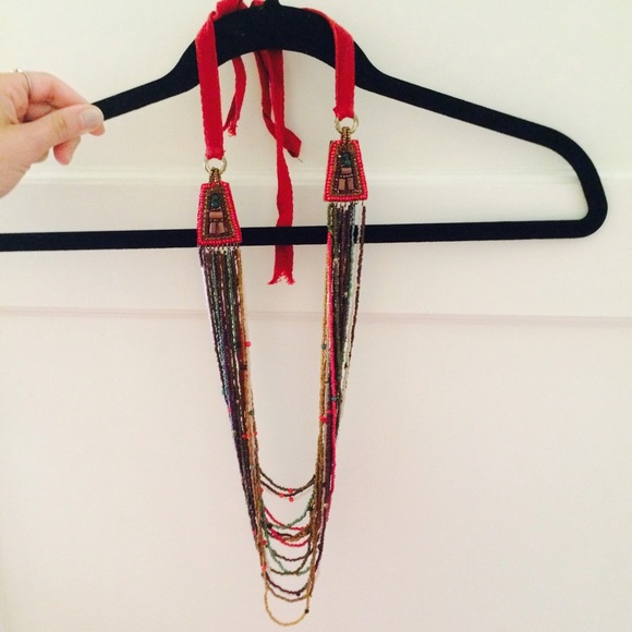 Beaded Necklace with Red Ribbon Tie