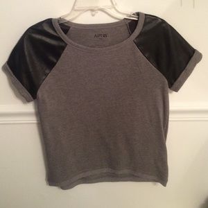 Grey top with leather detailing on sleeves