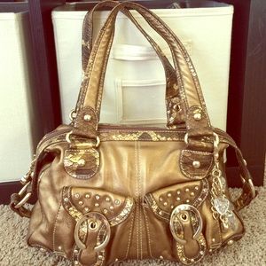 Kathy Van Zeeland gold purse