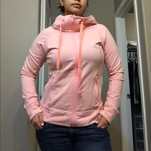 HOLDING Lululemon zip up & white tank