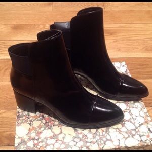 Black faux leather boots