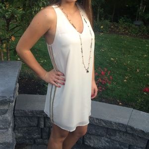 champagne colored dress. Size small (2-4).