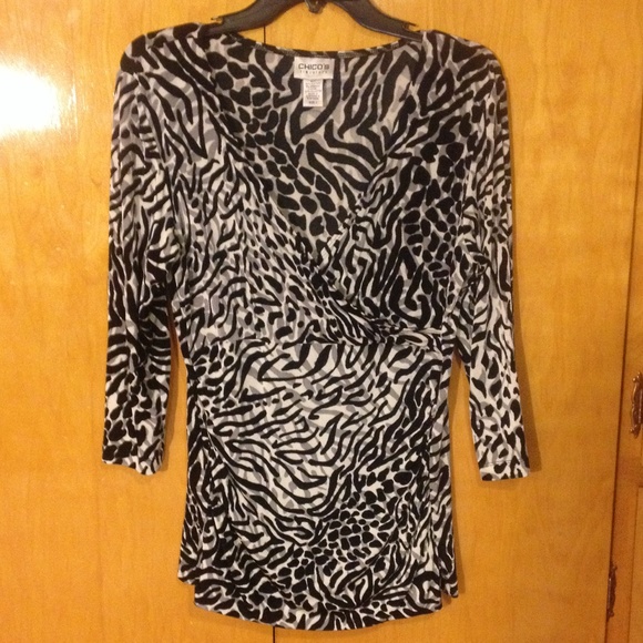 Chico's Travelers animal print top sz 1 equals med