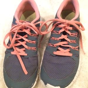 peach and grey Nike free runs