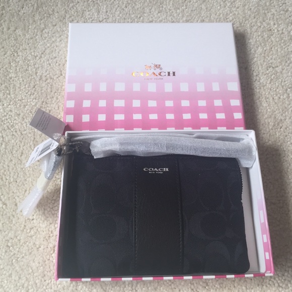 Black Embossed Signature Canvas Coach Wristlet