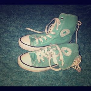 Aqua blue high top converse