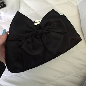 Black bow clutch