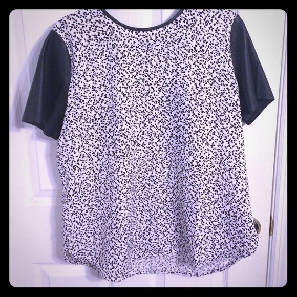 Ann Taylor tunic top with faux leather sleeves.