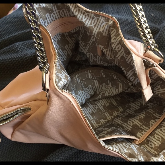 jlo coach pink bag