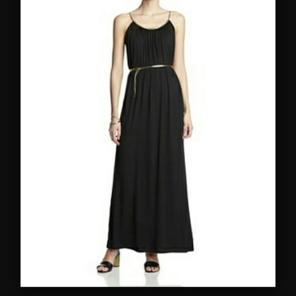 Black dress with gold trim on neck and shoulder