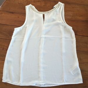 White beaded detail blouse.