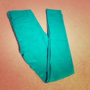 Turquoise colored skinny jeans
