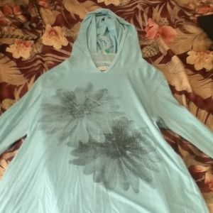 A long Sleeved Light Blue Shirt