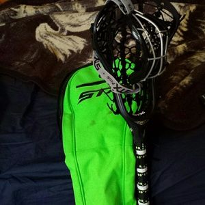 Lacrosse Stick, Mask, and bag.