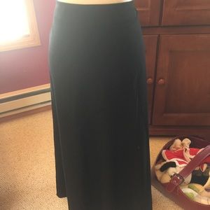 Long black skirt with soft knit feel.