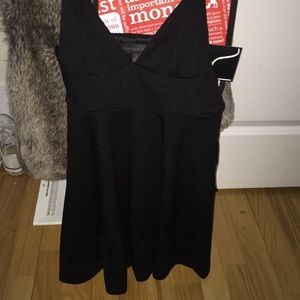 Stretchy black dress! Some what short!