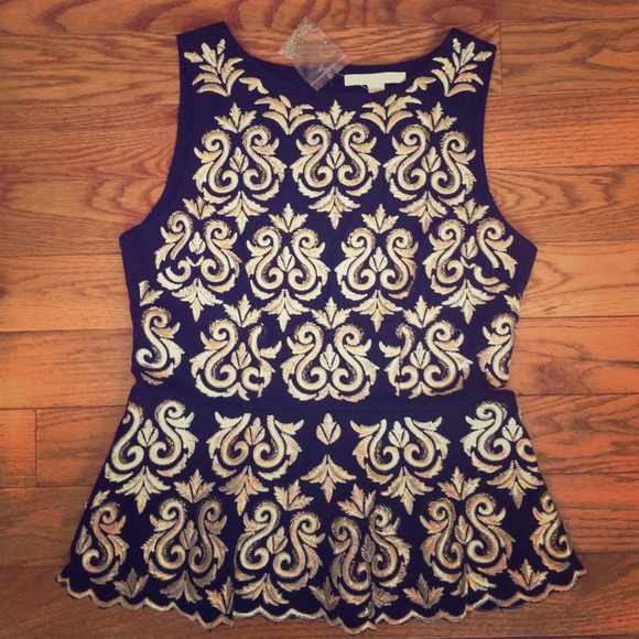 Never worn Black & Gold peplum