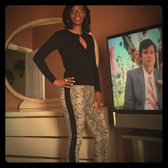 Snakeskin print pants. - Picture 1 of 2