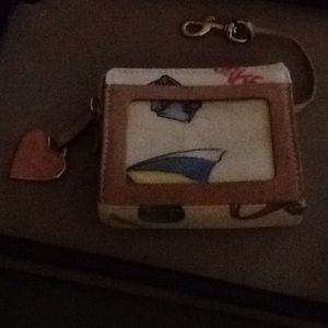 Dooney&Bourke change and 4 slots holder