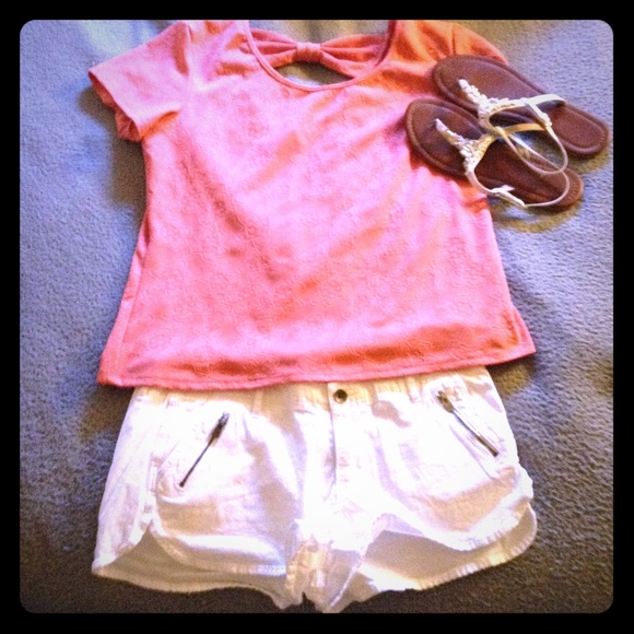 A pink short sleeved shirt.