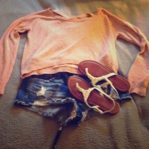 Long sleeved, pink crop top with cross in back