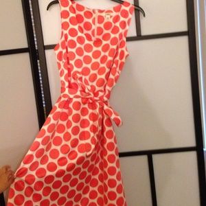 Coral belted polka dot dress with A line skirt
