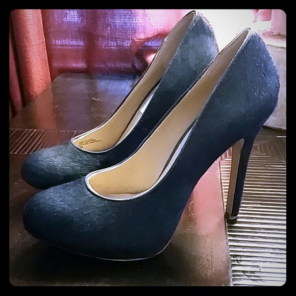 INC.. blue pumps