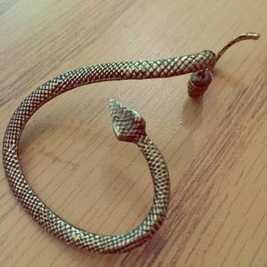 Gold snake ear cuff