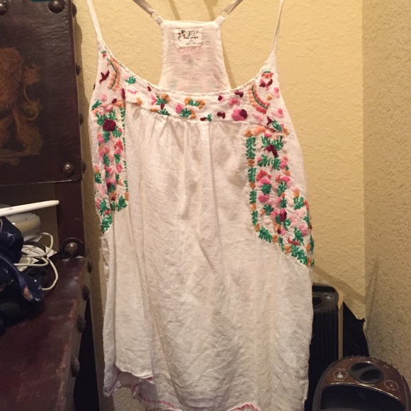 Free people tank, slit on back, perfect quality