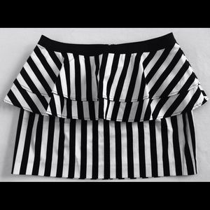 Black as white stripped peplum skirt.